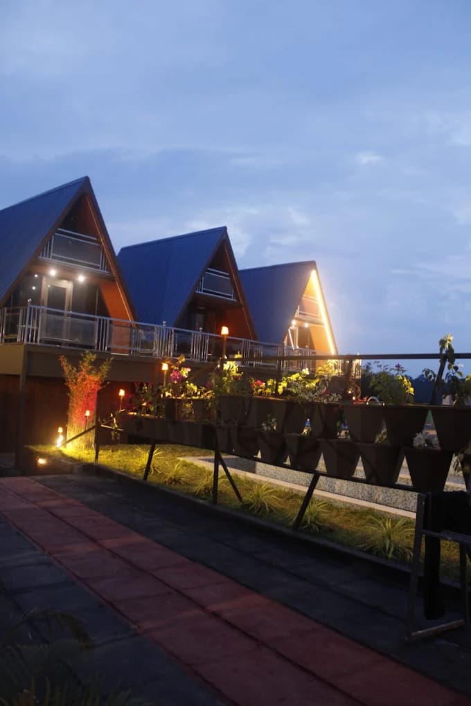 Garden walkway and evening lanterns at Mist Wave Resort Wayanad