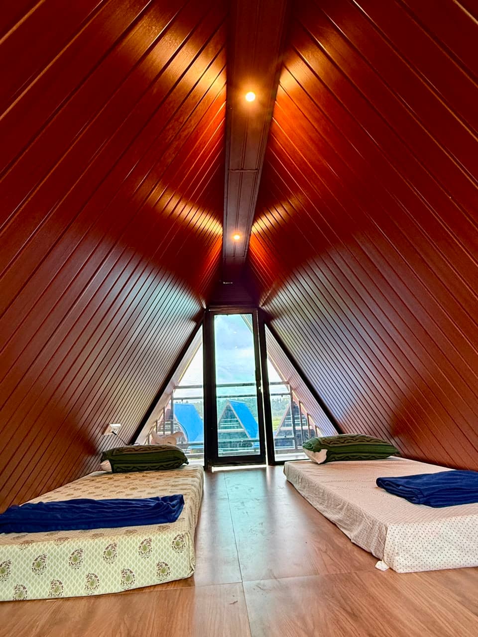 Family Loft chalet mezzanine bedroom interior at Mist Wave Resort Wayanad